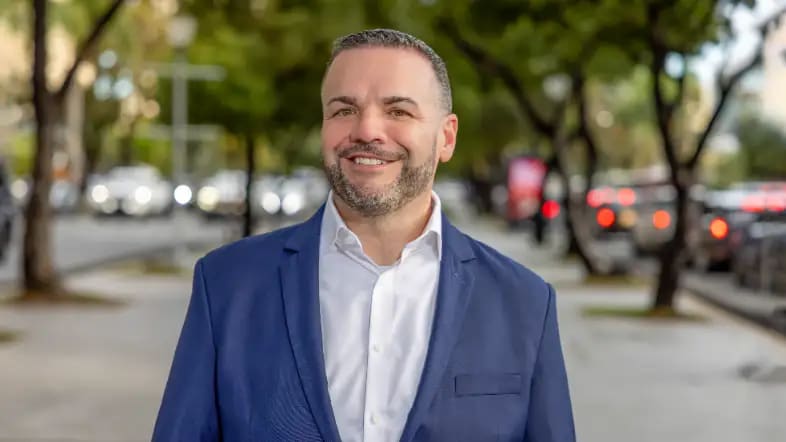 Corporate portrait at office or chosen location — DR